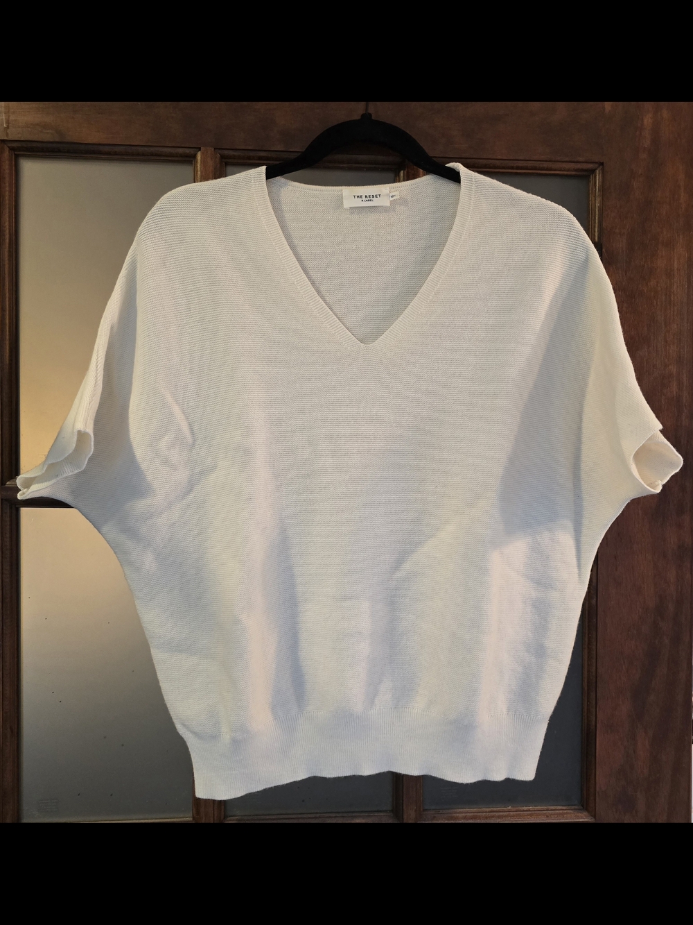 The Reset Women's V-Neck Short Sleeve Sweater in Off-White
